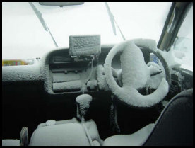 Snow mobile - someone left the car sunroof open