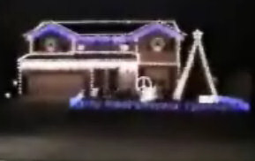 Christmas house lights ban the bomb CND sign