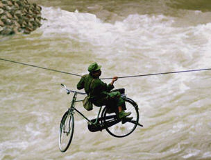 Cyclist crossing river