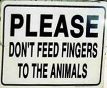 Funny Signs - No feeding fingers to the animals