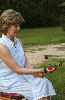 Abigail with hummingbirds