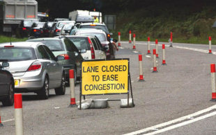 Lane closed to ease congestion