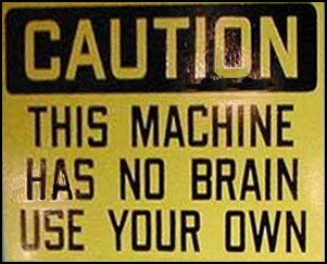 Funny Warning Sign - Caution this machine has no brain