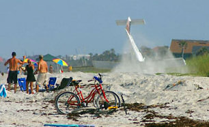 Sunbathers escape beach plane crash - Luck escape