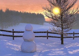 Christmas snowman at sunset