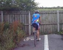 Cyclist at end of cycle path