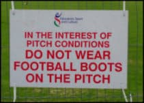 Do not wear football boots sign