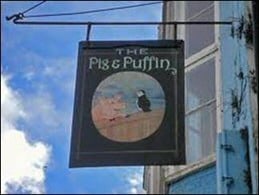 Pig puffin pub sign