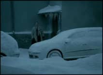Clearing snow off car
