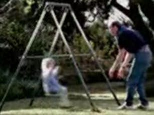 No kids - little girl on a swing